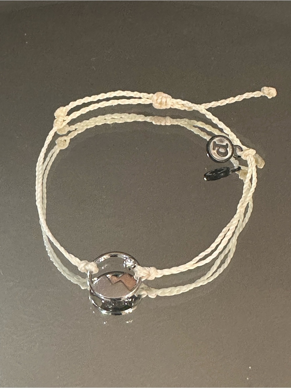 Pura Vida. Ivory Cord Bracelet with Silver Mountain Charm